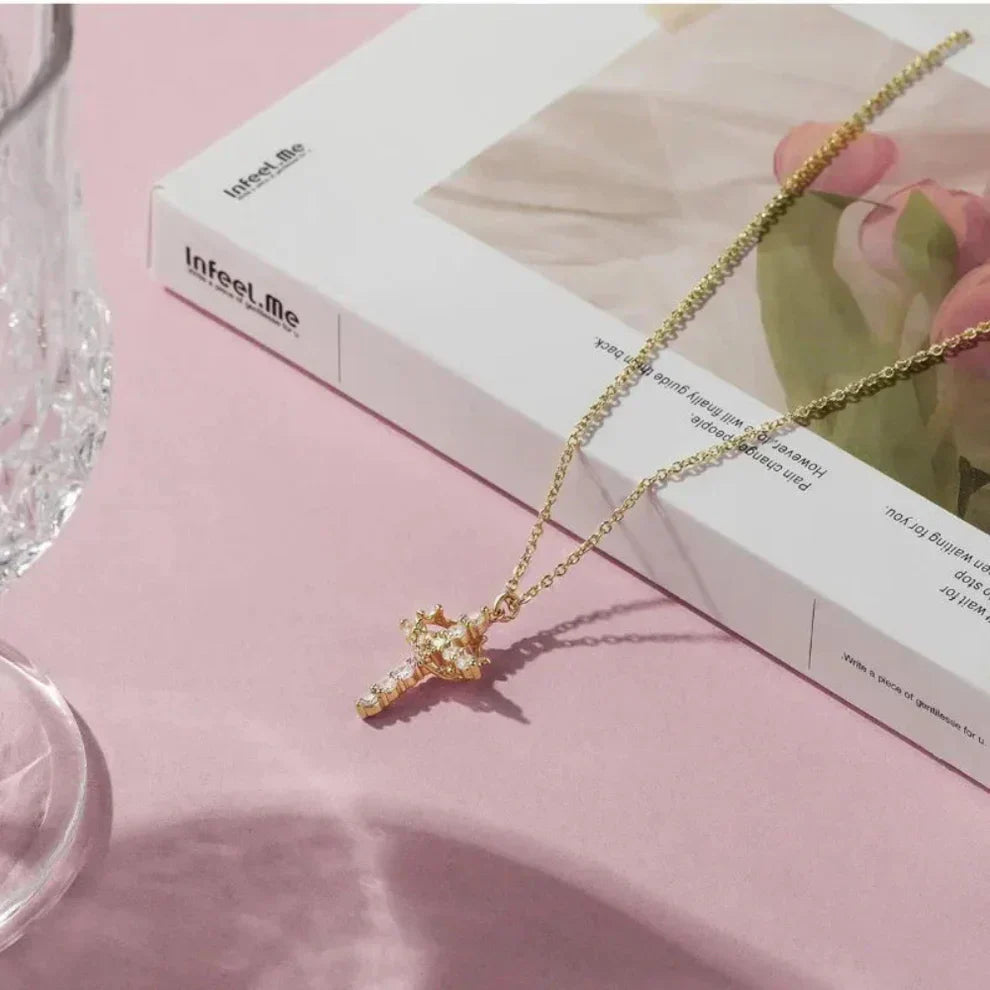 Collana Croce con Corona Rotante